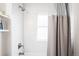 Bright bathroom with white tiled walls and modern fixtures at 1918 S Lincoln St, Denver, CO 80210