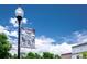 South Pearl Street banner and street lamp against a bright blue sky at 1918 S Lincoln St, Denver, CO 80210