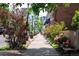 Charming street view featuring a landscaped sidewalk lined with shops, greenery, and trees at 1918 S Lincoln St, Denver, CO 80210