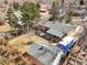 Aerial view of the property showcasing the home, backyard, mature trees and surrounding neighborhood at 7209 S Sherman St, Centennial, CO 80122