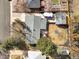 Aerial view of the property showcasing the home, yard, detached garage, mature trees and overall layout at 7209 S Sherman St, Centennial, CO 80122