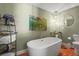 Elegant bathroom with a freestanding tub, modern fixtures, and stylish décor at 7209 S Sherman St, Centennial, CO 80122