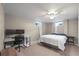 Bedroom with neutral walls, a ceiling fan, and a desk and monitor setup at 7209 S Sherman St, Centennial, CO 80122