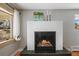 Close-up of a contemporary fireplace, showcasing clean lines and a cozy ambiance in a well-lit room at 7209 S Sherman St, Centennial, CO 80122