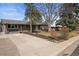 Charming single-story home with a well-maintained front yard and mature trees at 7209 S Sherman St, Centennial, CO 80122