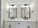 Modern bathroom vanity with double sinks, sleek fixtures, and ample counter space at 6707 S Elizabeth St, Centennial, CO 80122