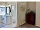 Bathroom with a modern vanity, bright natural light, and access to a shower/tub area at 6895 W 84Th Way # 4, Arvada, CO 80003