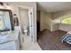 Bathroom with a vanity, granite countertops, modern fixtures, and adjacent bedroom area at 6895 W 84Th Way # 4, Arvada, CO 80003