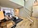 Open concept living area with light-colored floors, natural light, and modern furnishings at 6895 W 84Th Way # 4, Arvada, CO 80003