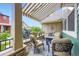 Cozy covered patio with comfortable seating and neutral decor, perfect for relaxing at 529 Gallegos Cir, Erie, CO 80516