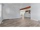 Open living room with staircase and wood-look floors at 257 Wadsworth Cir, Longmont, CO 80504