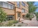 Charming brick apartment building with landscaped entrance and welcoming facade at 1523 Ivy St # 6, Denver, CO 80220