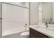 Bathroom with modern fixtures, tiled shower/tub, and sleek vanity, creating a stylish and functional space at 483 Basin Daisy St, Castle Rock, CO 80104