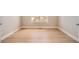 Empty bedroom with hardwood flooring and a window with natural light at 483 Basin Daisy St, Castle Rock, CO 80104