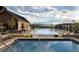 Beautiful community pool with lounge chairs and mountain views at 483 Basin Daisy St, Castle Rock, CO 80104