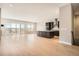 Expansive living room and kitchen area with modern finishes and ample natural light at 483 Basin Daisy St, Castle Rock, CO 80104