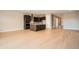 Spacious living room featuring sliding glass doors, hardwood floors, and modern finishes at 483 Basin Daisy St, Castle Rock, CO 80104