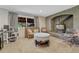 Bright living room features brick fireplace with wood-burning stove and outside view at 25694 Stansbery St, Conifer, CO 80433