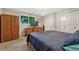 Relaxing main bedroom includes ample closet space and large window with views of the backyard at 25694 Stansbery St, Conifer, CO 80433