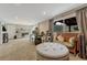 Finished basement area featuring carpet, natural light, and flexible living space at 25694 Stansbery St, Conifer, CO 80433