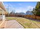 Large backyard with brick patio and wood fence at 5285 S Jericho Way, Centennial, CO 80015