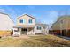 Home exterior view showing back yard with covered porch at 5285 S Jericho Way, Centennial, CO 80015