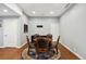 Basement game room with table and chairs at 7905 Schumaker Rd, Bennett, CO 80102