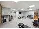 Spacious basement gym with various workout equipment at 7905 Schumaker Rd, Bennett, CO 80102