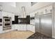 Modern kitchen with stainless steel appliances and granite countertops at 7905 Schumaker Rd, Bennett, CO 80102