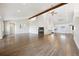 Living room with hardwood floors and high ceilings at 7905 Schumaker Rd, Bennett, CO 80102