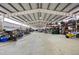 Large workshop with high ceilings and ample storage at 7905 Schumaker Rd, Bennett, CO 80102