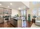 Modern kitchen features stainless steel appliances, granite countertops and stylish cabinets at 15063 E Crestridge Dr, Centennial, CO 80015