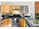 Stylish kitchen with modern appliances, sleek countertops, and light wood cabinetry at 361 Elati St, Denver, CO 80223