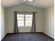 Serene bedroom with vaulted ceiling and window, providing a relaxing atmosphere for rest and relaxation at 7777 S Biloxi Way, Aurora, CO 80016