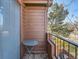 Small balcony with a table, offering a peaceful view at 9485 W 81St Ave # B, Arvada, CO 80005