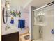 Basement bathroom with shower and vanity at 9485 W 81St Ave # B, Arvada, CO 80005