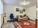 Finished basement with a couch and rug at 9485 W 81St Ave # B, Arvada, CO 80005