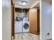 Basement laundry room with washer and dryer at 9485 W 81St Ave # B, Arvada, CO 80005