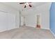 Bright bedroom with generous closet space and an ensuite bathroom, offering convenience and privacy at 8943 Tappy Toorie Cir, Highlands Ranch, CO 80129