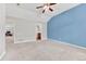 Spacious bedroom with high ceilings, neutral walls, and ample natural light streaming through the window at 8943 Tappy Toorie Cir, Highlands Ranch, CO 80129