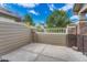 Enclosed patio featuring decorative fence, concrete pavers and blue skies at 8943 Tappy Toorie Cir, Highlands Ranch, CO 80129