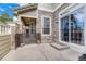 Stone patio features stone facade with sliding glass doors at 8943 Tappy Toorie Cir, Highlands Ranch, CO 80129