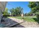 The backyard is spacious, flat, and includes a hammock and shed at 6436 S Kline St, Littleton, CO 80127