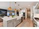 Modern kitchen with stainless steel appliances and island at 6437 Saddlesmith St, Castle Pines, CO 80108