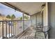 Balcony with chairs and neighborhood views at 18302 E Kepner Pl # 207, Aurora, CO 80017