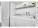 Laundry area with washer and dryer at 18302 E Kepner Pl # 207, Aurora, CO 80017