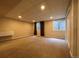 Finished basement with carpet flooring, window, and recessed lighting at 438 N Parkside Dr # C, Longmont, CO 80501