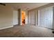 Bedroom with three closets and an ensuite bathroom at 438 N Parkside Dr # C, Longmont, CO 80501