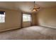 Large bedroom with carpet, ceiling fan, and vaulted ceilings for added height and light at 438 N Parkside Dr # C, Longmont, CO 80501