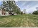 Neighborhood featuring a well maintained grassy field at 438 N Parkside Dr # C, Longmont, CO 80501